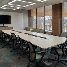 Our training room can accommodate 16 people around tables and has additional lounge seating along the windows.