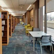We have lounge seating and small tables adjacent to our nonfiction collection by our windows with a southern exposure.