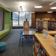 Two window seats in the Youth Services Room provide places for children to curl up with a good book.